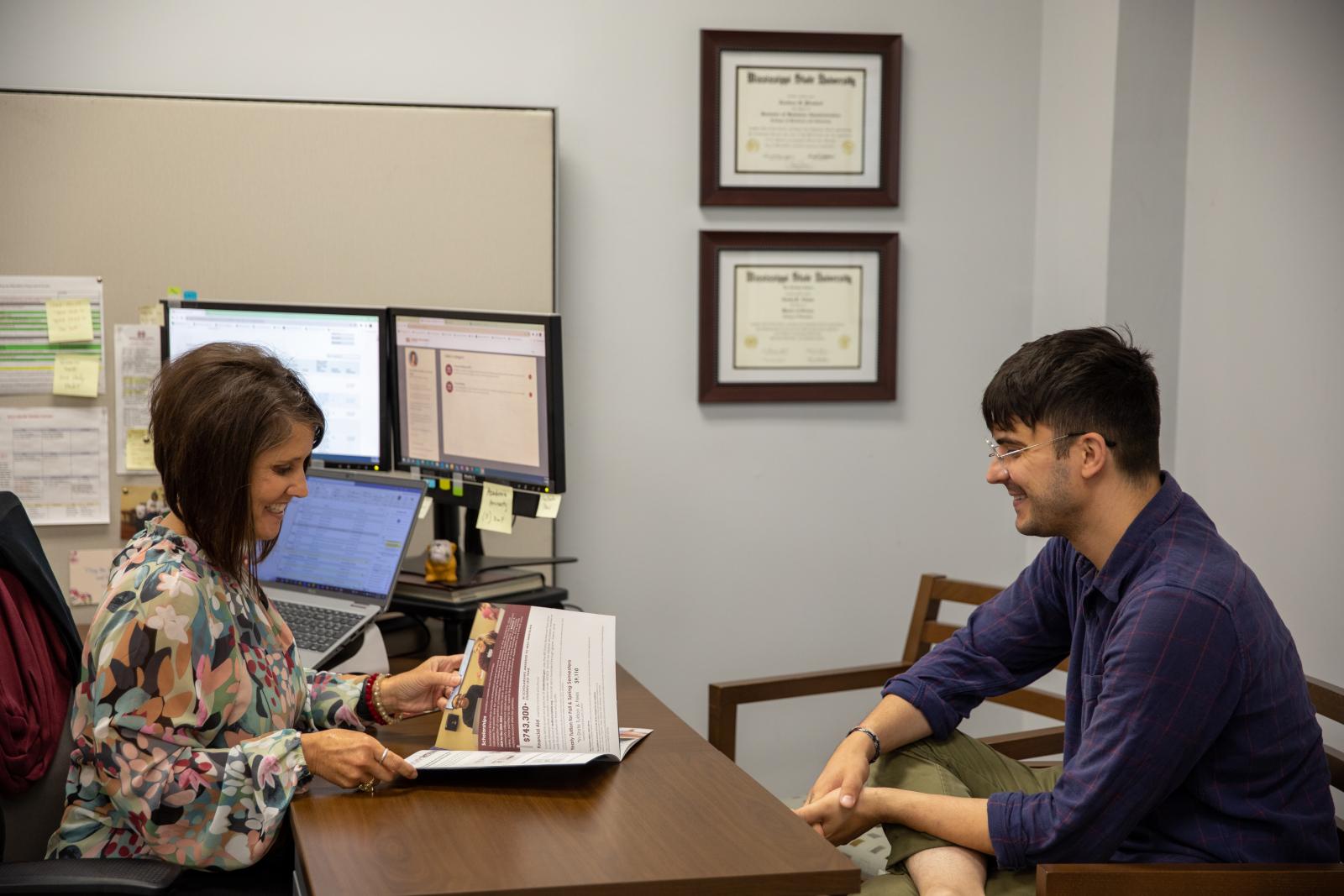 MSU Meridian Advisor helping student review material